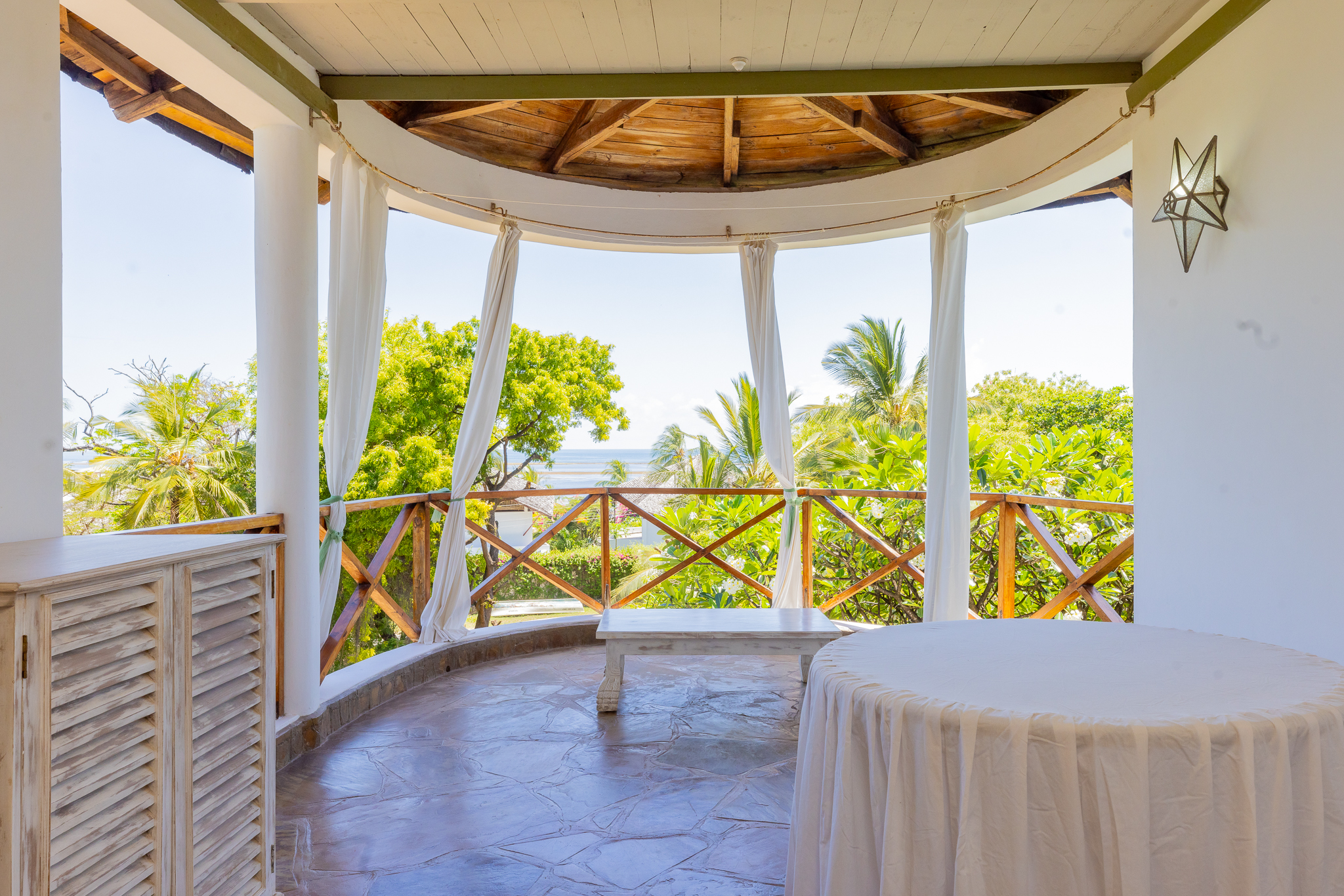 Open-air balcony pavilion overlooking the coast at Silver Rock Boutique Resort